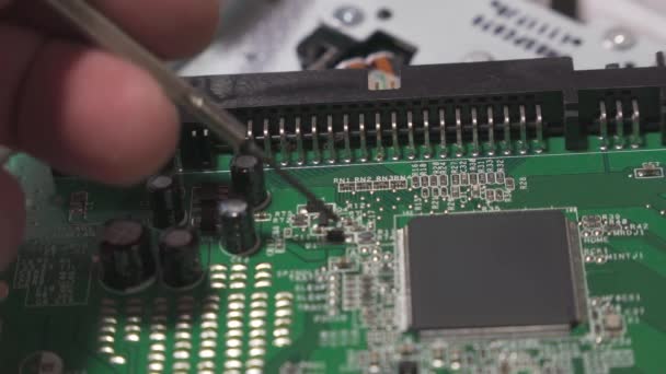 Consumer Electronics Repairman Makes Inspection Check Digital Circuit Board Close — Vídeos de Stock