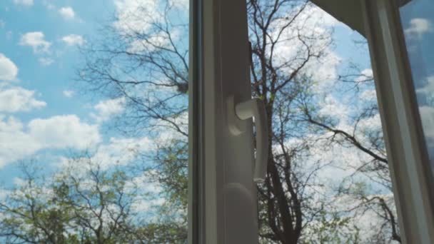 Man Hand Closes Window Window Blue Sky Clouds Good Sunny — Vídeo de Stock