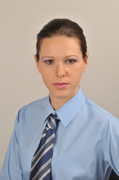 Serious girl, dressed in business clothing — Stock Photo, Image