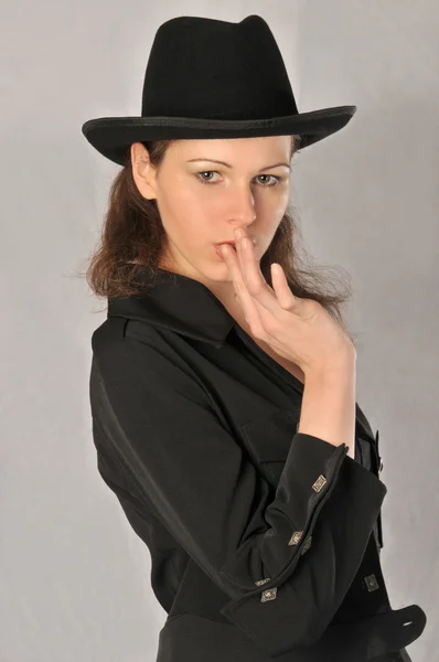 Portrait of a beautiful girl in a hat — Stock Photo, Image