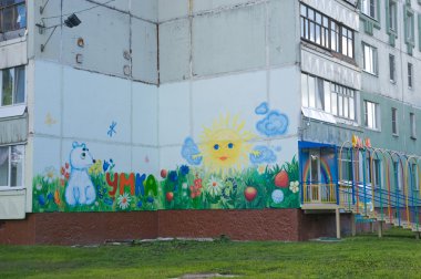 Painted wall of a house near the children's shop, city of Tula clipart