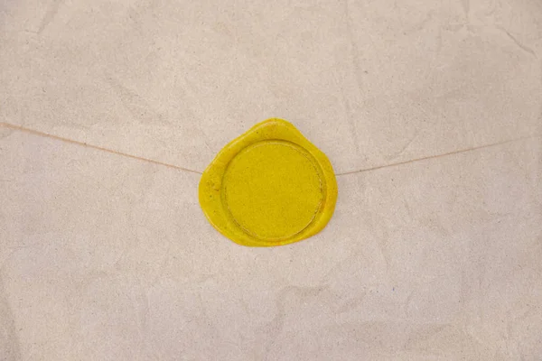 Close Wrinkled Brown Craft Paper Envelope Empty Yellow Wax Seal — Stock Photo, Image