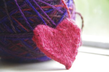 Knitted heart and yarn clipart