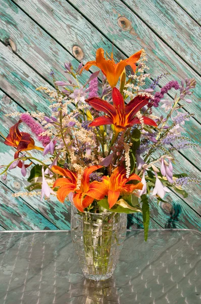 Still life bouquet: hosta, astilbe and hemerocallis — Stock Photo, Image