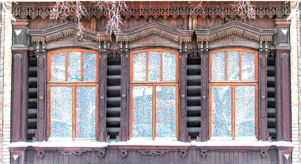 Three old wooden curving tradition siberia windows — Stock Photo, Image