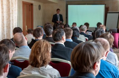 insanların arka iş seminer ve konuşmacı olarak ekran üzerinde