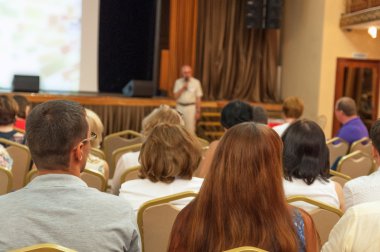 People sitting rear at the business conference and speaker
