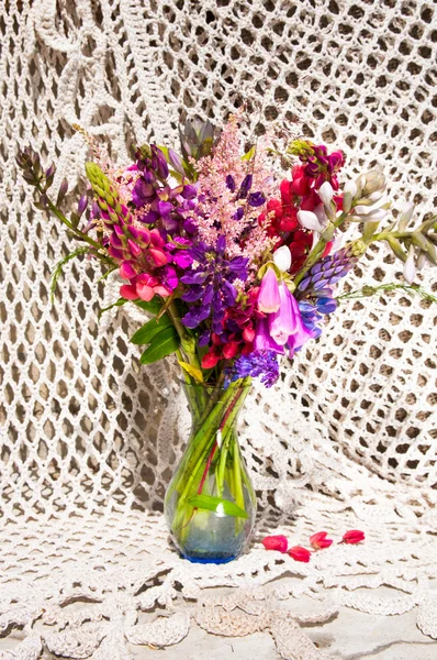 Still life bouquet with lupine and bright flowers — Stock Photo, Image