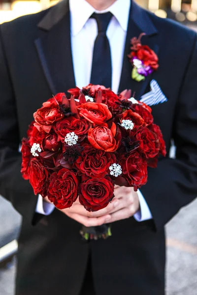 Groom holding the Bouquet — Stock Photo, Image