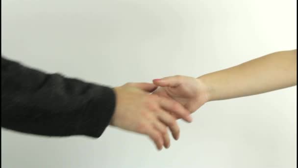 Man and woman shaking hands, isolated on white — Stock Video