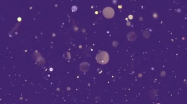 Işıldayan parçacıklar altın konfeti parıldıyor arka planda parlamalar