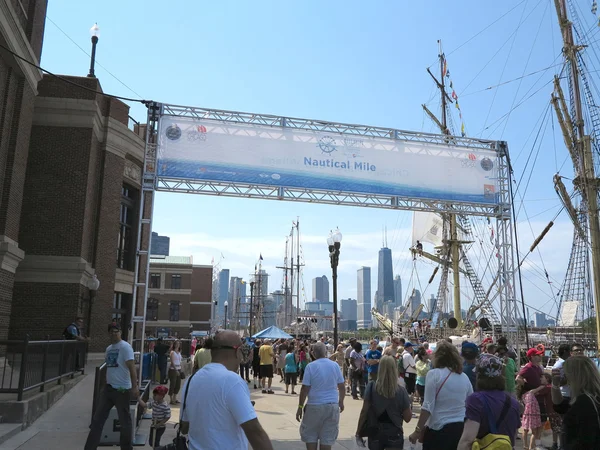 Tall ships tourists enjoy the festivities at Navy Pier in Chicago with weather front moving in — Stock Photo, Image