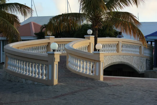 Colorful bridge and buildings welcome visitors and locals to Philipsburg St. Martin — Stock Photo, Image