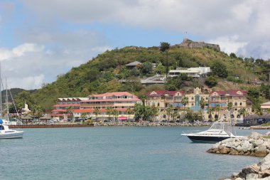 Old French Fort Louis seen from harbor area or bay in Marigot St. Martin clipart