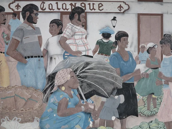 Arte crioula recebe visitantes e locais em Marigot, St. Martin Imagens Royalty-Free