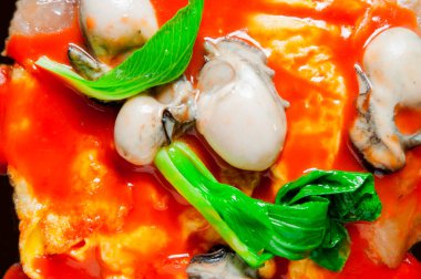 Kızarmış istiridye, Tayvan ve Fujian 'da geleneksel deniz ürünleri atıştırmalığı.