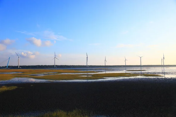 Windmills in Gaomei Wetland Park, a scenic spot on the west coast of Taichung, Taiwan