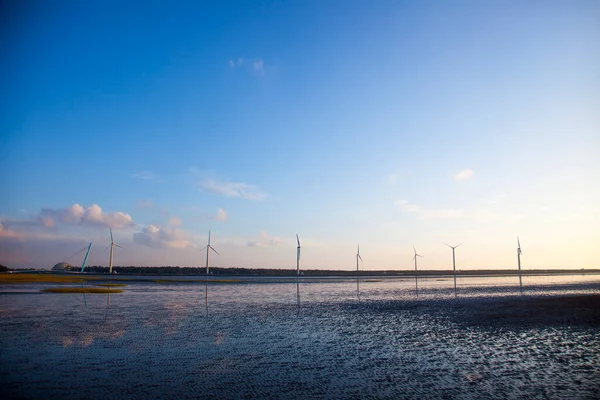 Windmills in Gaomei Wetland Park, a scenic spot on the west coast of Taichung, Taiwan