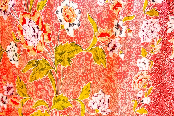Red fabric colorful batik background in thailand — Stock Photo, Image