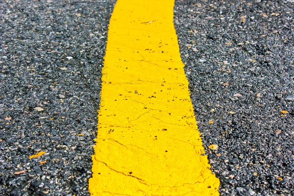 Asphalt road yellow line close up background — Stock Photo, Image