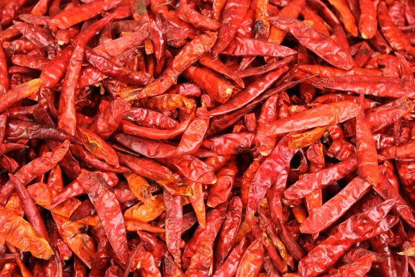 Seco vermelho quente chillies textura fundo — Fotografia de Stock