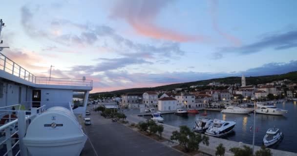 Panoramic view on Supetar town on the Island of Brac at the sunrise - Editorial, DCI 4K, Audio, Ultra Wide, Pan — Stock Video