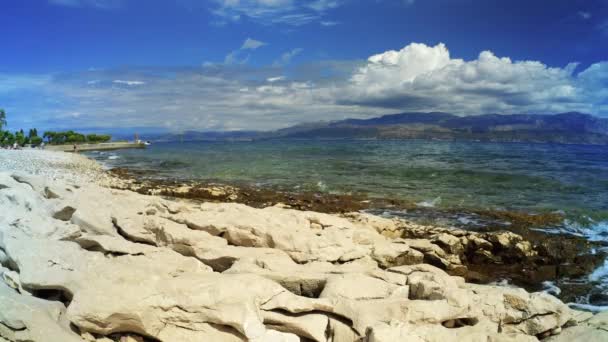 Calm waves crashing on rocky beach on Island of Brac, Croatia - 4K, Binaural Audio, Ultra-wide shot — Stok video