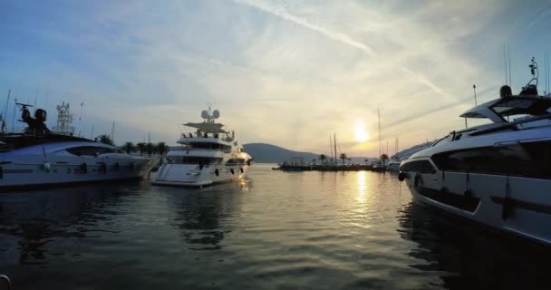 Luxury super-yacht arrives at sunset in Porto Montenegro, Tivat - Editorial, DCI 4K, Wide, Handheld — Stok video