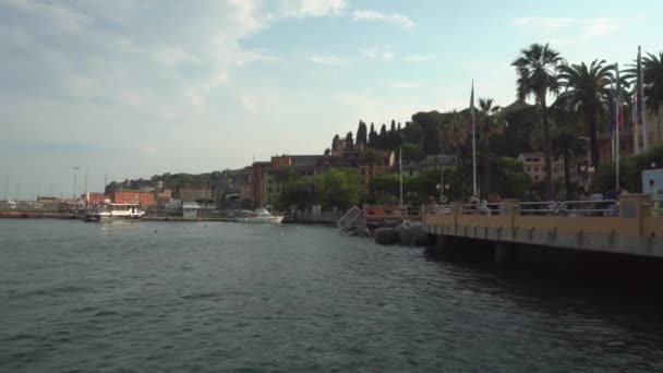 Rapallo waterfront and tourist boats at summer sunset, Italy - 2K, Editorial, Audio, Pan — Vídeos de Stock
