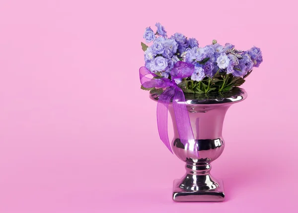 Bunch of flowers on pink background — Stock Photo, Image