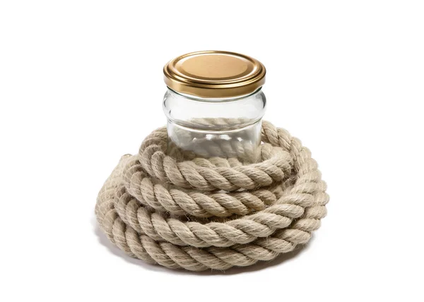 Glass jar and Coil of rope on isolated background — Stock Photo, Image