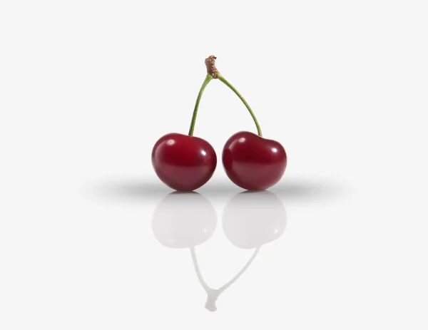 Several sweet ripe cherry on white background — Stock Photo, Image