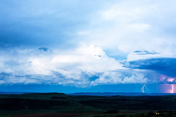 Dark cumulus clouds and lightning after sunset Drakensberg South Africa