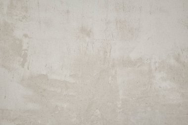 Eski beton duvar dokusu. İnşaat yüzeyi çiziyor. Soyut vintage taşları çatlatmış, kremsi doğal renk, grunge tavan arası, antika tasarım.
