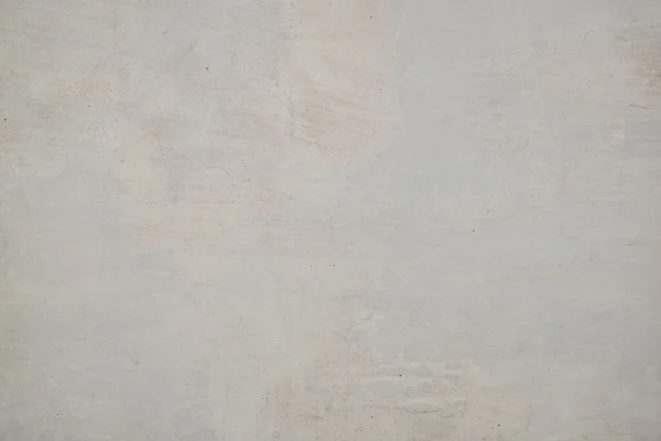 Eski beton duvar dokusu. İnşaat yüzeyi çiziyor. Soyut vintage taşları çatlatmış, kremsi doğal renk, grunge tavan arası, antika tasarım.