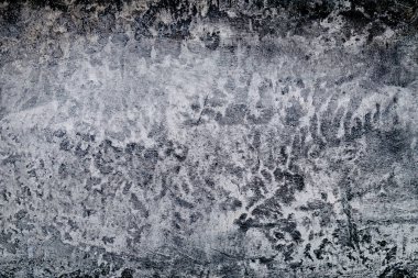 Koyu beton doku, beton bir duvarda beyaz gri ve koyu renkli güzel antika desen.