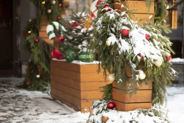 festive interior Christmas background wooden decor decorated Christmas tree and porch of a wooden house