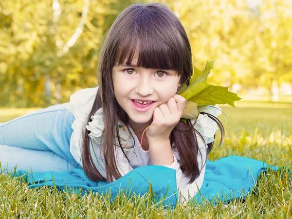 Little Child in autumn park — Stock Photo, Image