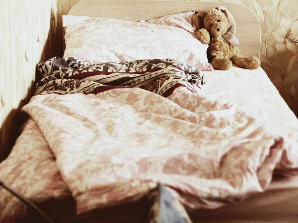 Rabbit toy on the bed — Stock Photo, Image