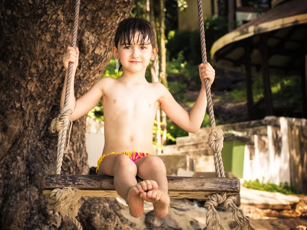 Young girl on swing — Stock Photo, Image