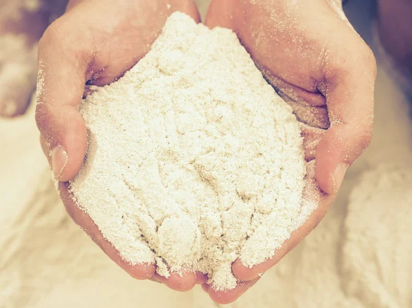 Hands holding sand — Stock Photo, Image