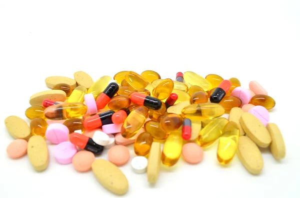 Montón de diferentes tipos de pastillas y tabletas —  Fotos de Stock