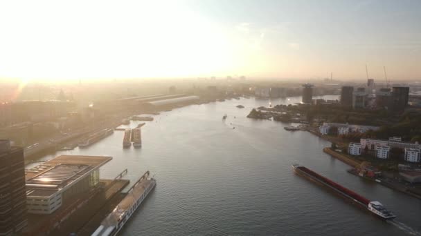 Aerial footage of the skyline of Amsterdam city center Ijburg the ferries and central station. — Stock Video