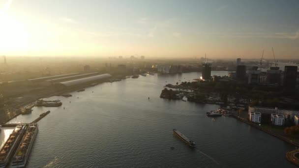 Aerial footage of the skyline of Amsterdam city center Ijburg the ferries and central station. — Stock Video