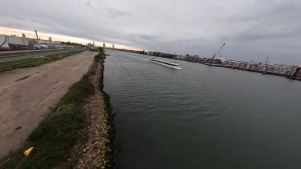 Rotterdam, 31th of October 2021, The Netherlands. Aerial fpv action shot of large transportation ships in the port of Rotterdam — Stock Video