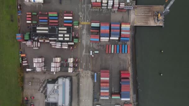 Container and silos in the Port of Rotterdam heavy industry and transportation along the Oude Maas Petroleum harbour aerial drone overview. — Stock Video
