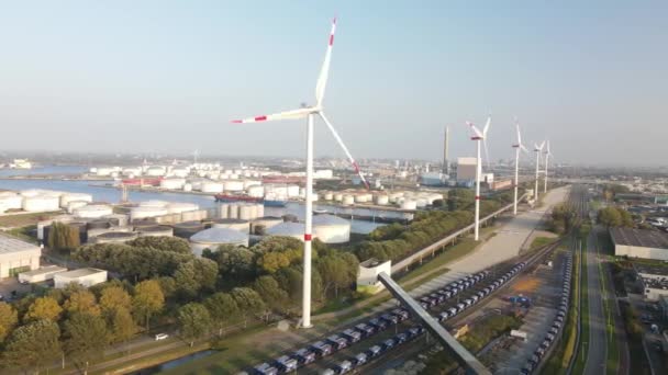 Aerial view of the Hemweg westpoort Amsterdam, t the harbour, windmills and Industrial buildings. Celan sustainable energy harvest. — Stock Video