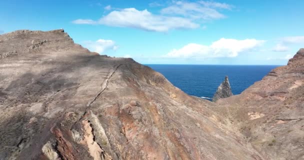 Ponta do Buraco Aerial overview. Epic dramatic overview of rock formation and the atlantic ocean. Madeira island Portugal in Europe. — Stockvideo