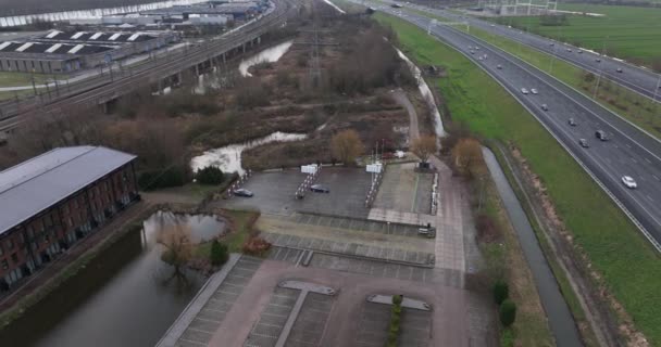 Breukelen, 31st of December 2021, The Netherlands. Teslag electric vehicle, EV charging station along the highway A2. — Stock Video