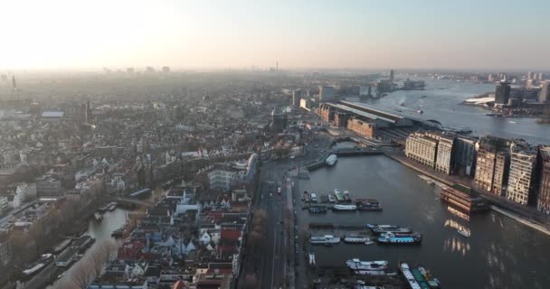 Amsterdam downtown city center central station landmark in The Netherlands. Historic european urban panoramic capital streets canals houses infrastructure and architecture. — Stock Video
